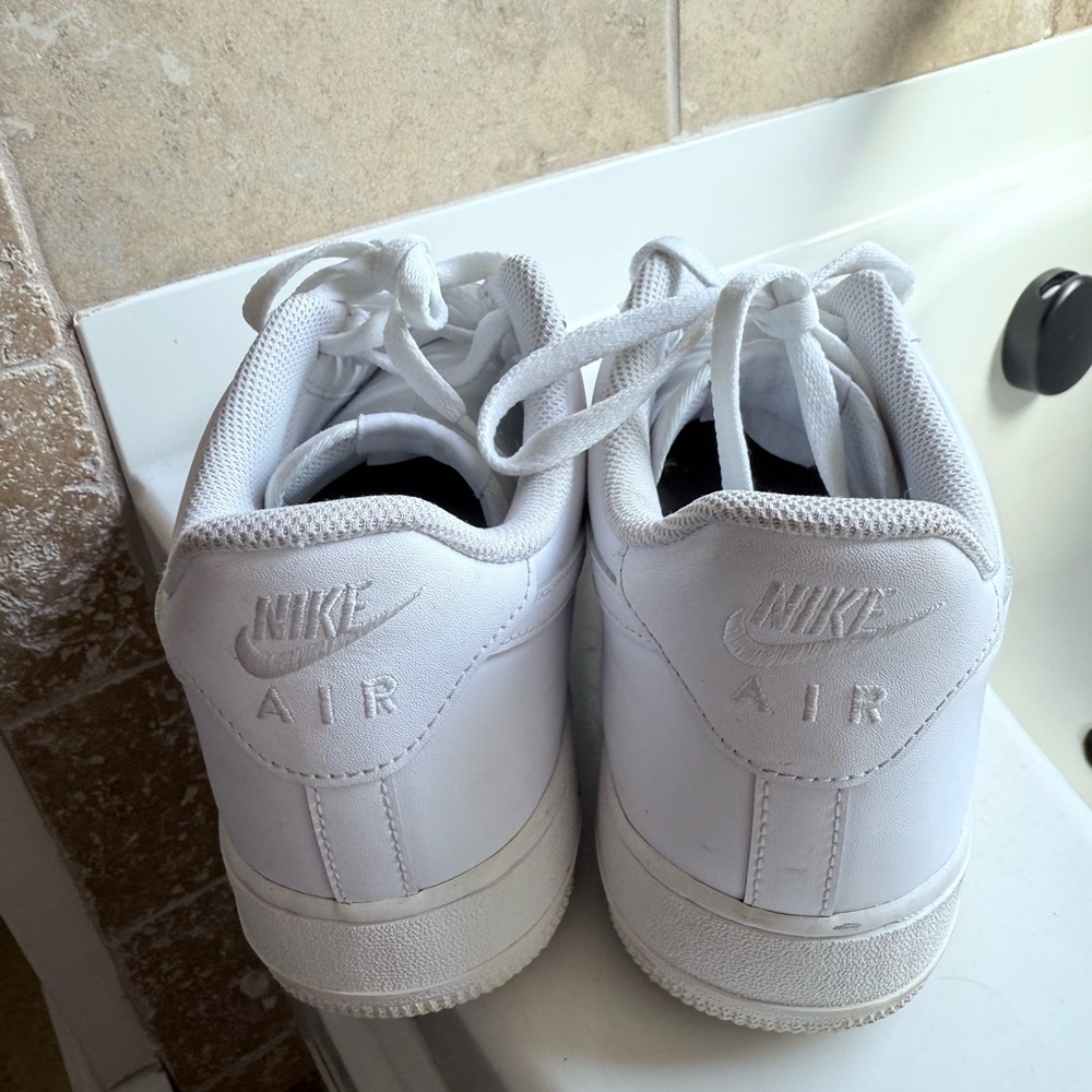 Men all white Air Force One’s